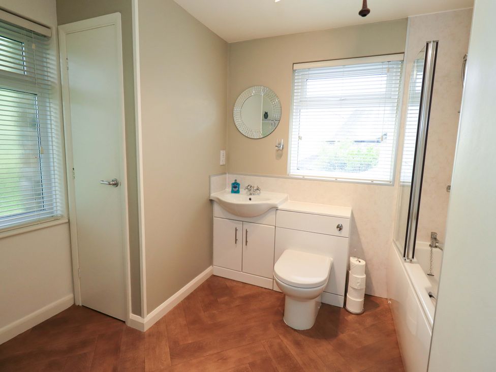 A bathroom with a sink and toilet at Back Cottage in Kirkby Lonsdale