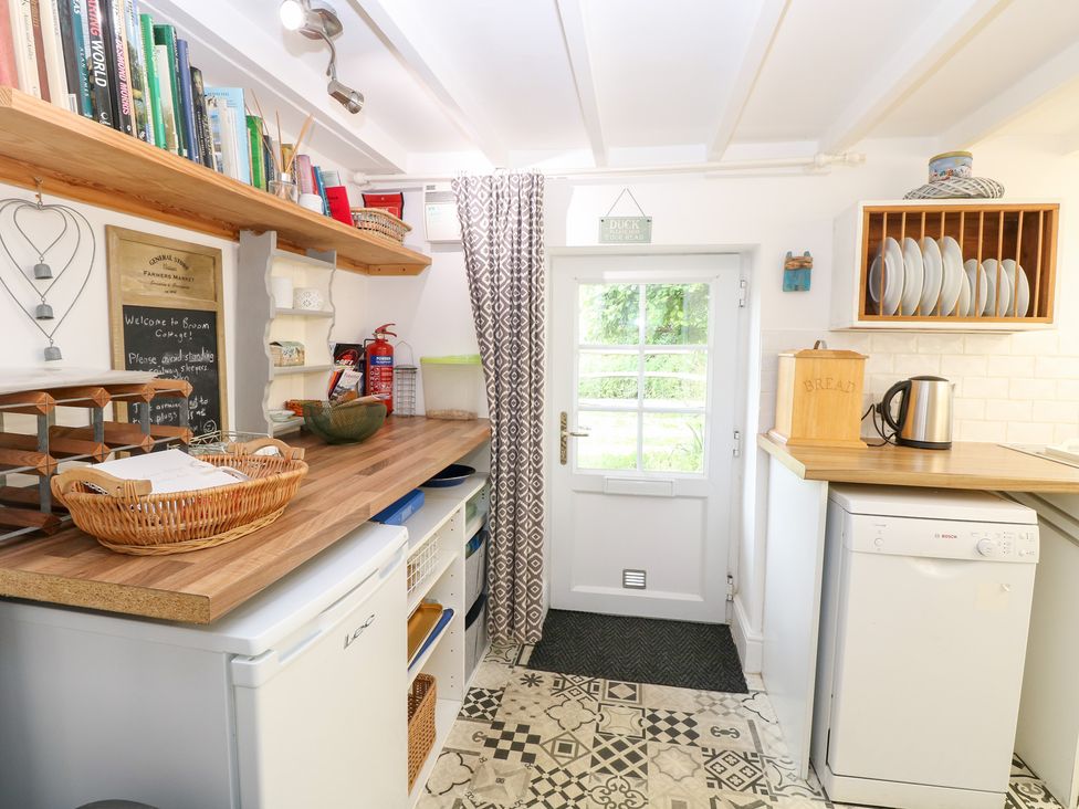 A kitchen with a countertop and appliances at Broom Cottage near East Rudham Fakenham