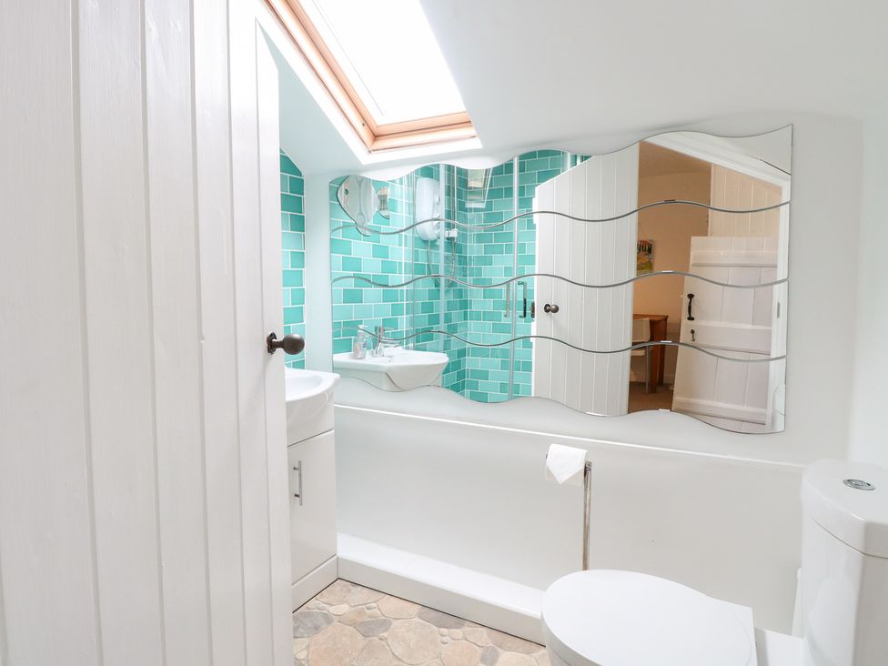 A bathroom with a sink and toilet at Broom Cottage East Rudham near Fakenham