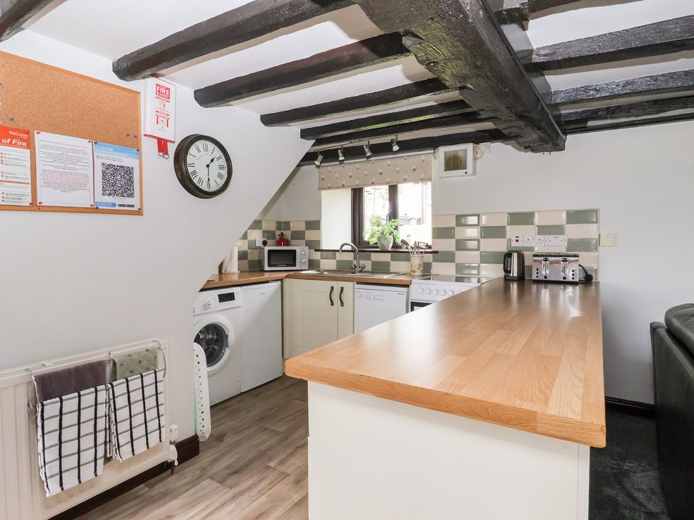 A kitchen with appliances and a counter at Wethercote Cottage Old Byland near Helmsley