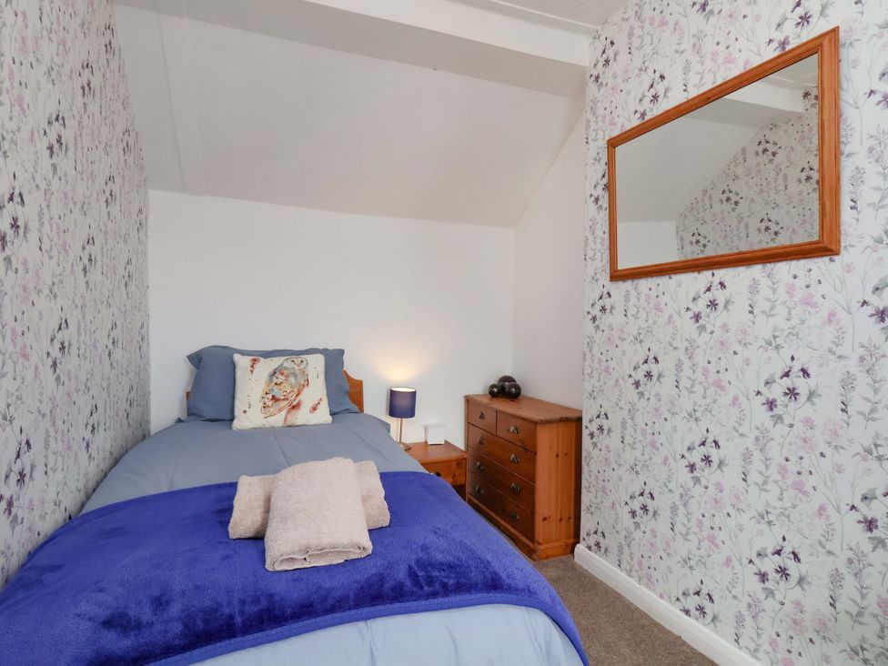 A bedroom with a bed and chest of drawers at Boundcliffe Farm Allerston near Pickering