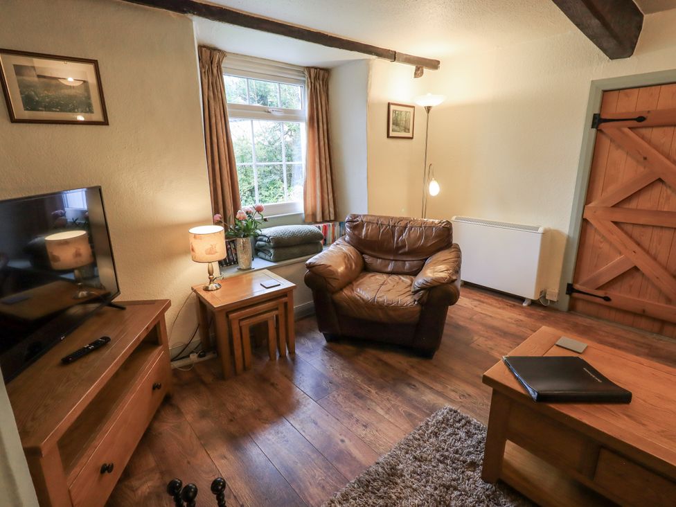 A living room with furniture and a television at Harber Scar Horton-in-Ribblesdale near Settle