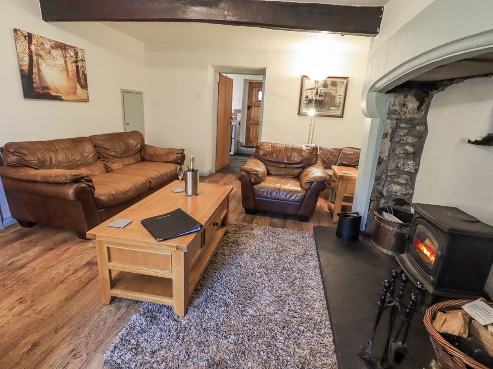 A living room with a sofa and coffee table at Harber Scar Horton-in-Ribblesdale near Settle