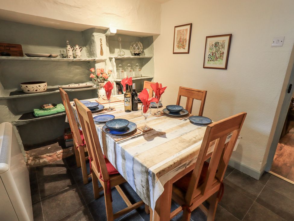 A dining room with a table set for a meal at Harber Scar Horton-in-Ribblesdale near Settle