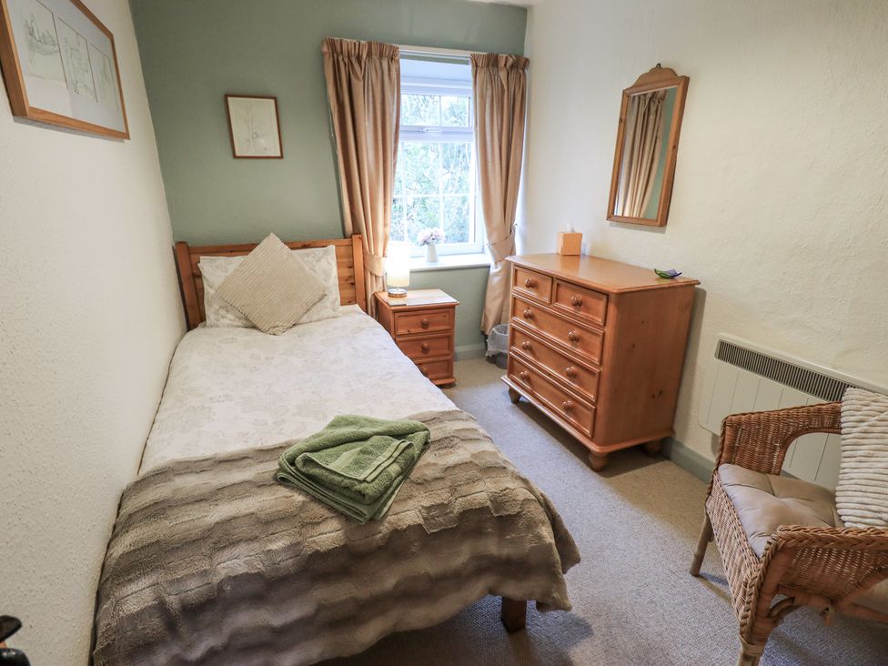 A bedroom with a single bed and wooden dresser at Harber Scar Horton-in-Ribblesdale near Settle