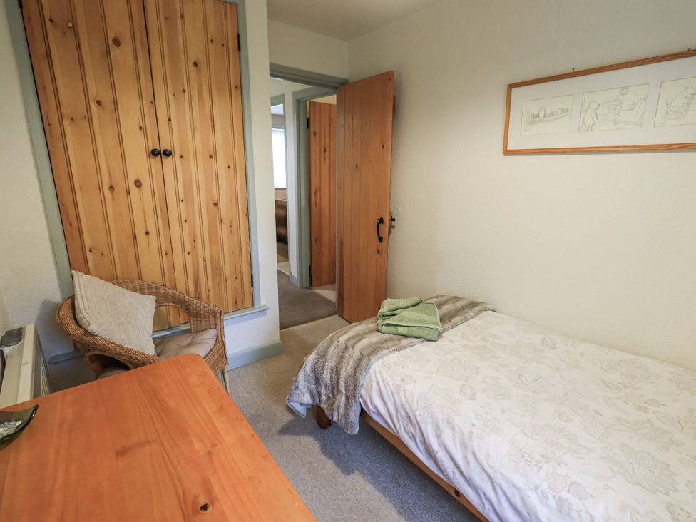 A bedroom with a bed and furniture at Harber Scar in Horton-in-Ribblesdale near Settle