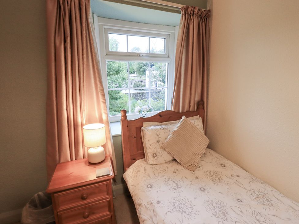 A bedroom with a bed and window at Harber Scar Horton-in-Ribblesdale near Settle