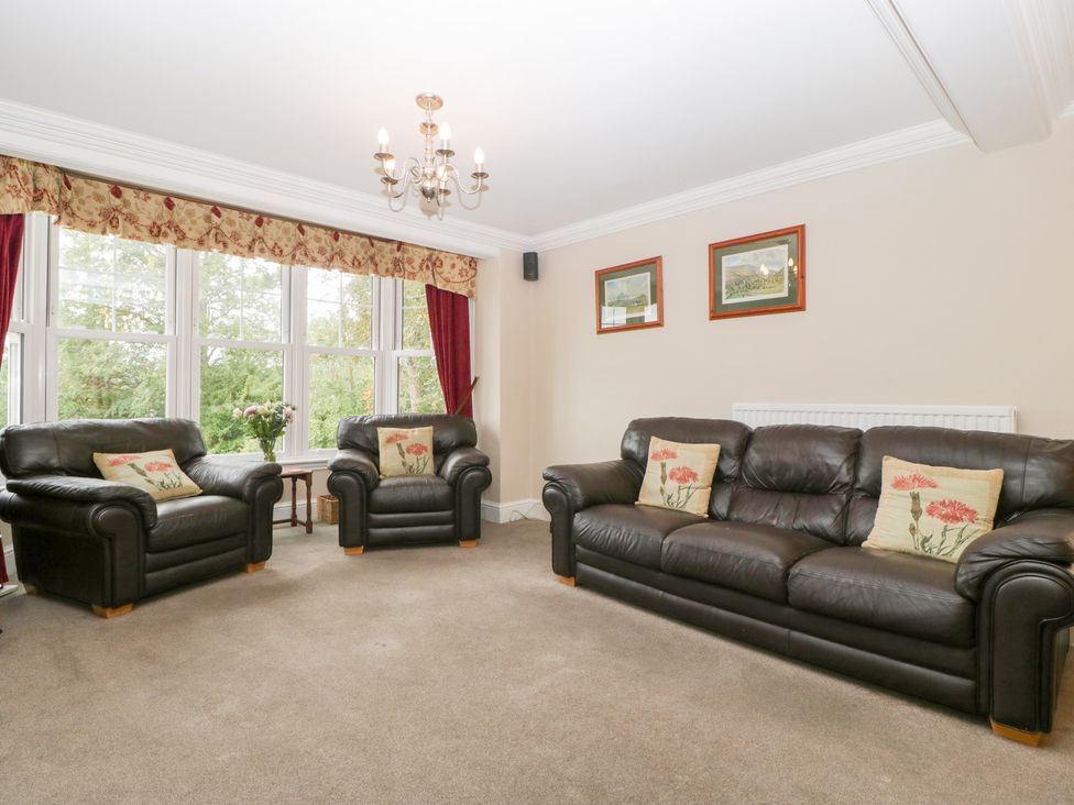 A living room with seating and a coffee table at The Croft in Vowchurch near Peterchurch