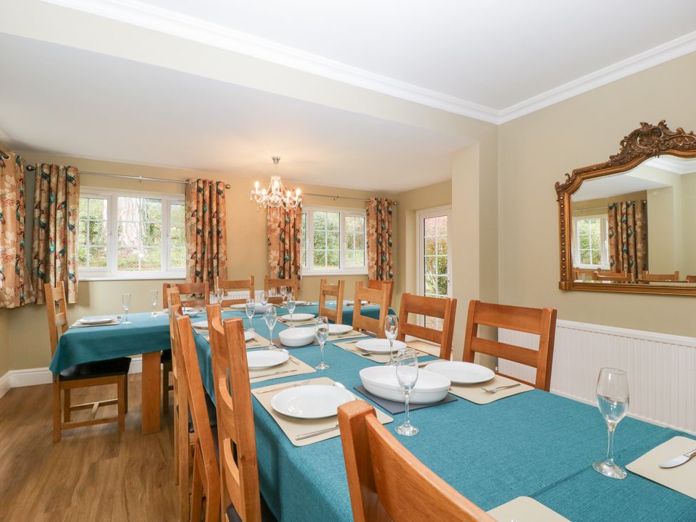 A dining room with a table set for a meal at The Croft in Vowchurch near Peterchurch