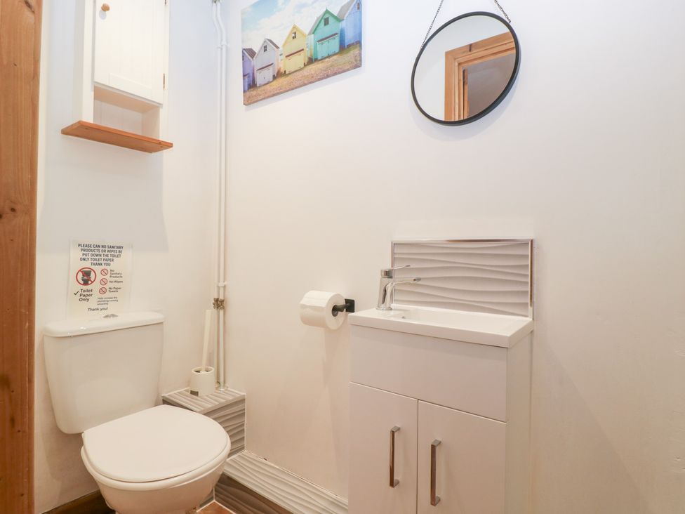 A bathroom with a sink and toilet at The Croft Vowchurch near Peterchurch