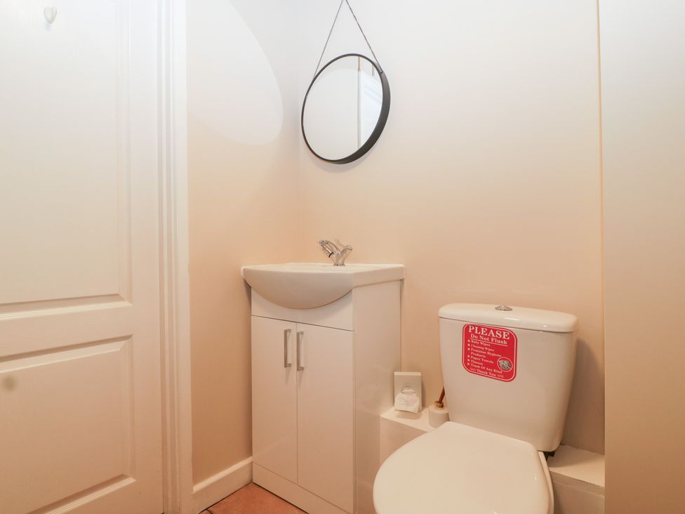 A bathroom with a sink and toilet at The Croft in Vowchurch near Peterchurch