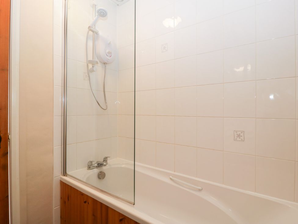 A bathroom with a bathtub and shower at The Croft in Vowchurch near Peterchurch
