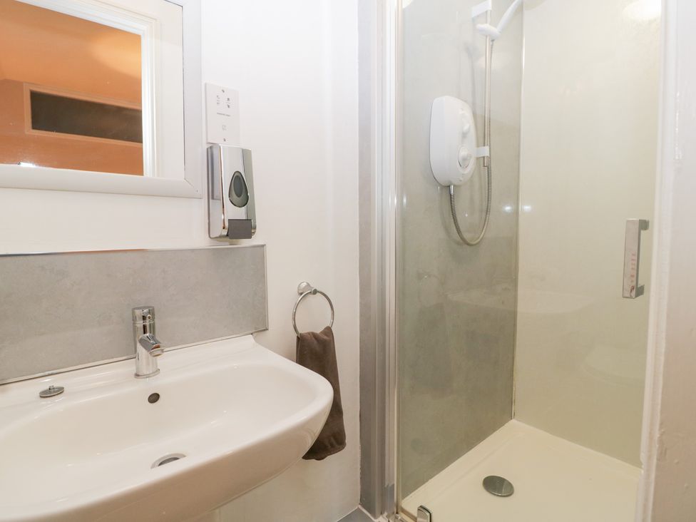 A bathroom with a sink and shower at The Croft in Vowchurch near Peterchurch