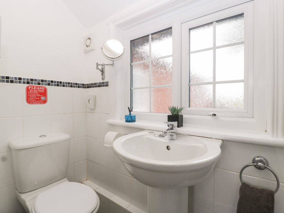 A bathroom with a toilet and sink at The Croft in Vowchurch near Peterchurch