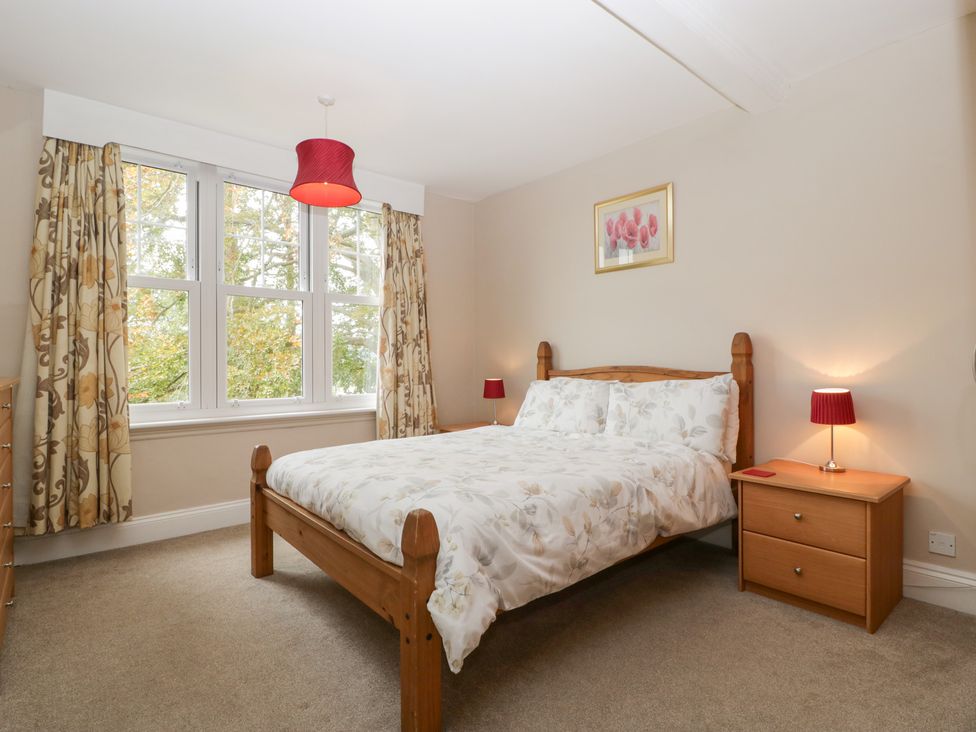 A bedroom with a bed and bedside table at The Croft in Vowchurch near Peterchurch