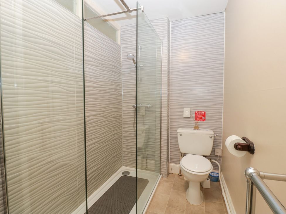 A bathroom with a shower and toilet at The Croft in Vowchurch near Peterchurch