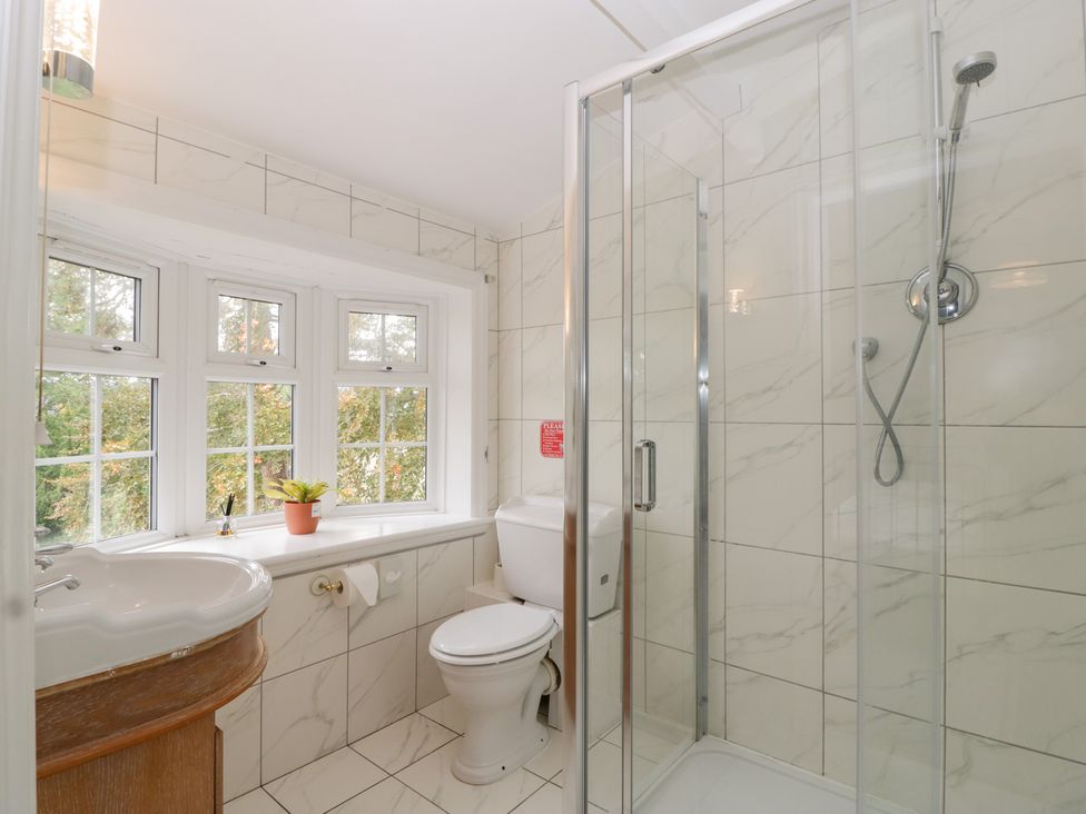 A bathroom with a shower and sink at The Croft in Vowchurch near Peterchurch