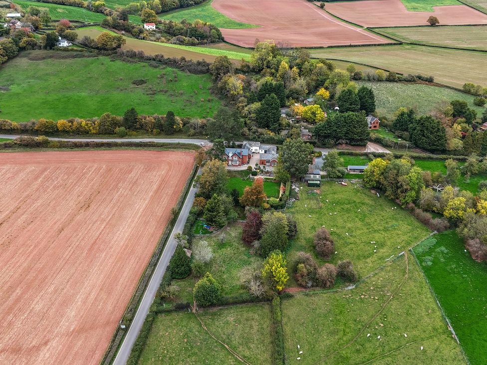 A landscape view of fields and houses at The Croft in Vowchurch near Peterchurch