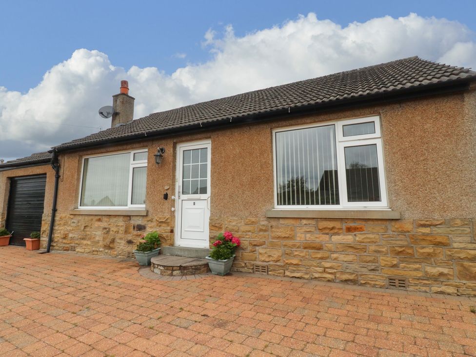A house with a front door and windows at Wynnville in Embsay near Skipton