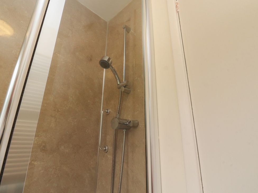 A shower with a showerhead and control at Wynnville in Embsay near Skipton