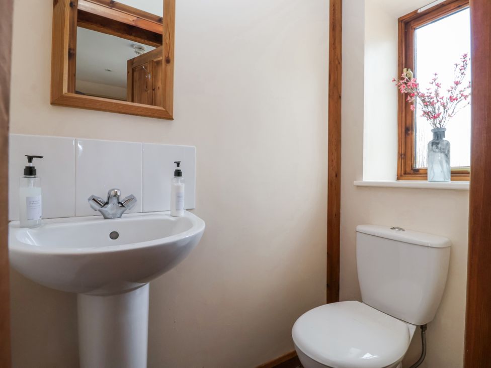 A bathroom with a sink and toilet at Croft Granary in Stillington near Easingwold and York