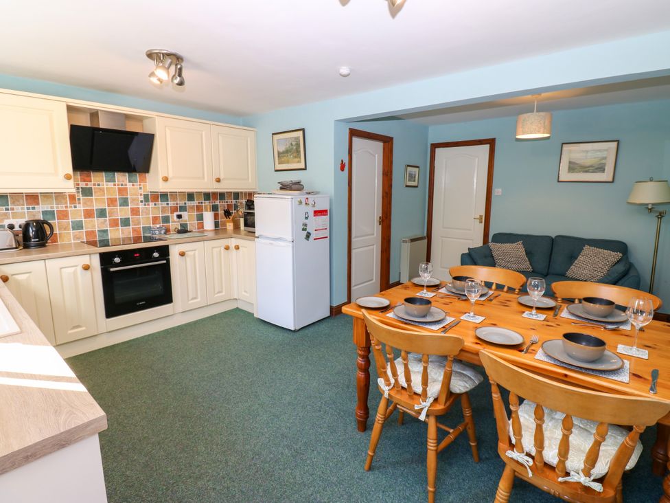 A kitchen with dining area and sitting space at Barnbrook in Carperby near Leyburn
