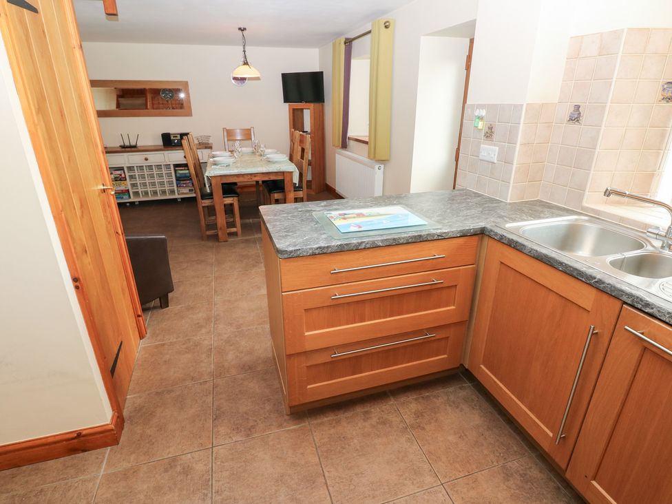 A kitchen with dining area in Bwthyn Trecoed St. Clears near Carmarthen