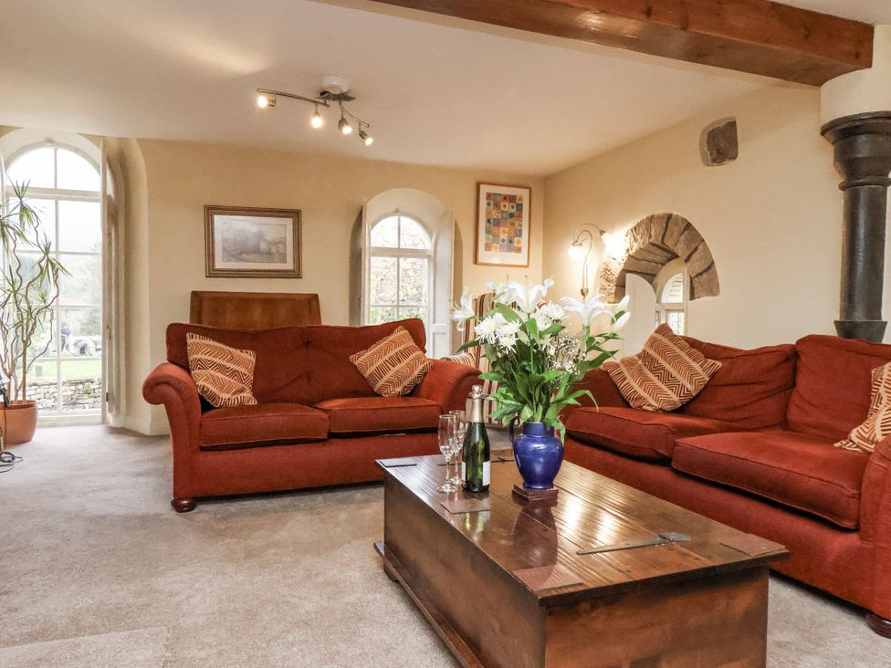 A living room with a sofa and coffee table at 1 The Old Methodist Chapel Rosedale Abbey