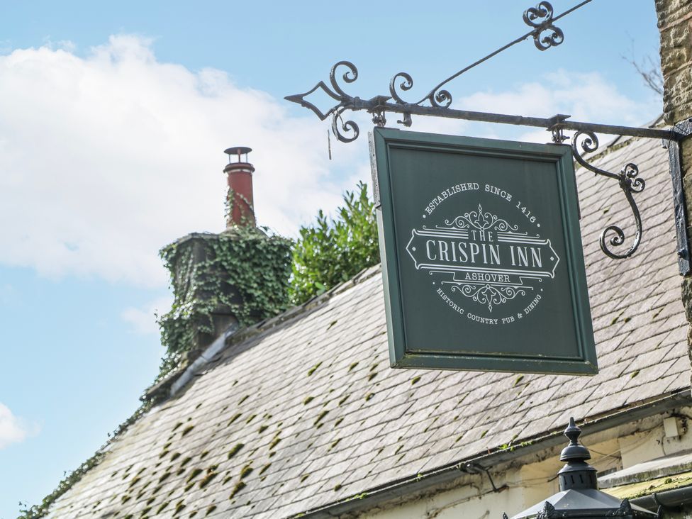 A sign for The Crispin Inn in Ashover