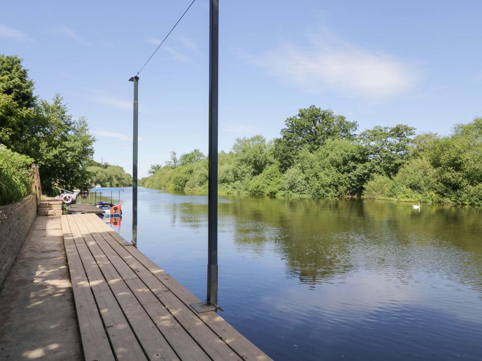 A dock along a river at Severn Bank Lodge Astley Burf near Stourport-on-Severn