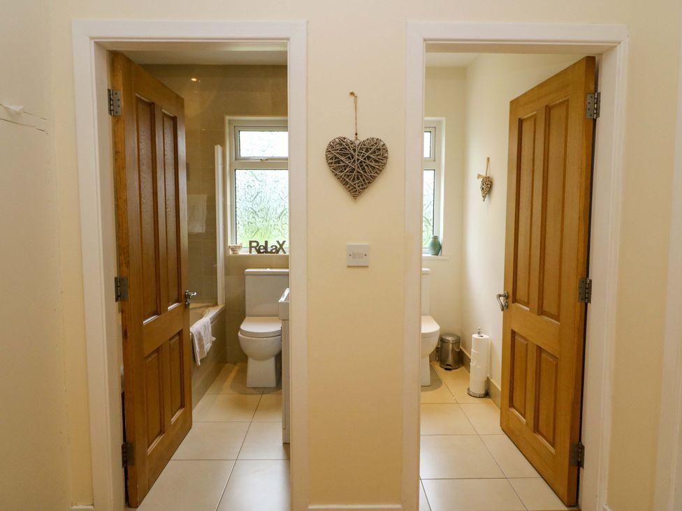 A bathroom with a sink and toilet in Rowantree, Beaufort, County Kerry