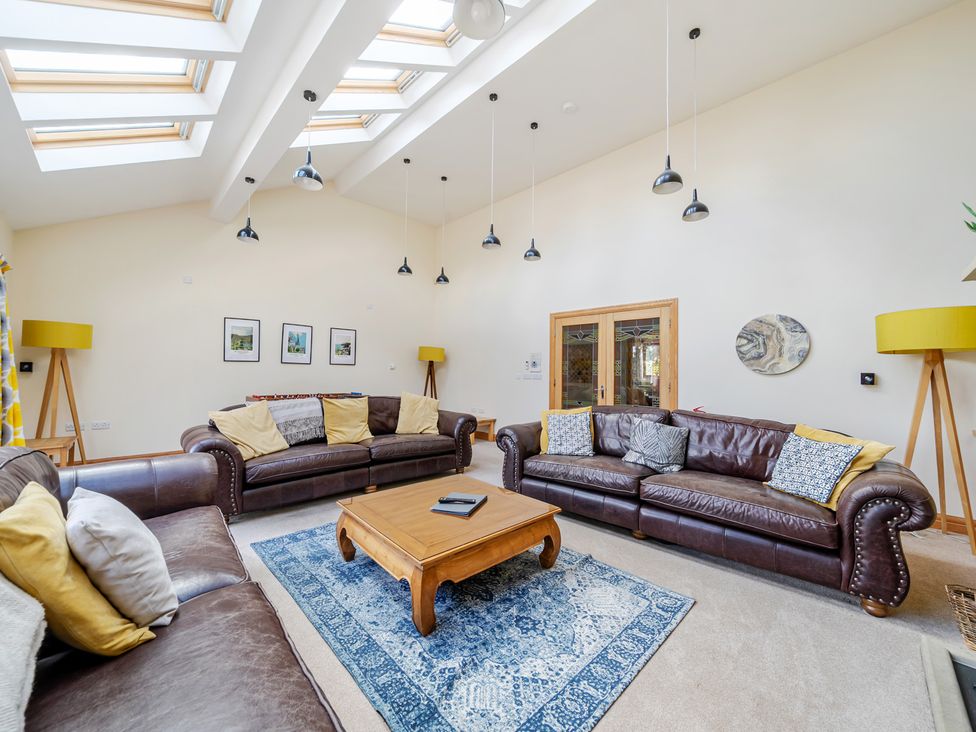 A living room with sofas and a coffee table at Manor House in Chesterfield