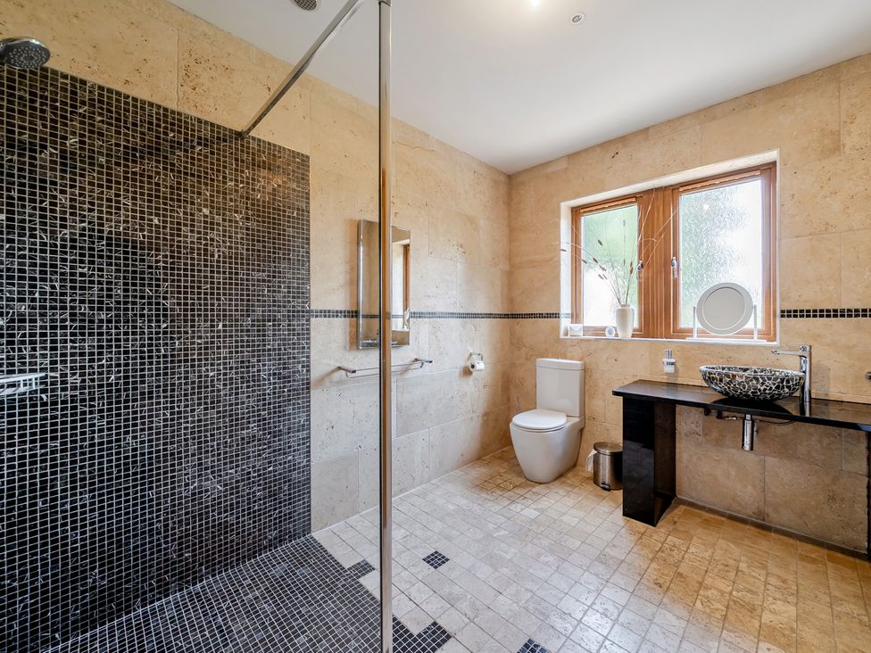 A bathroom with a shower and toilet at Manor House in Chesterfield