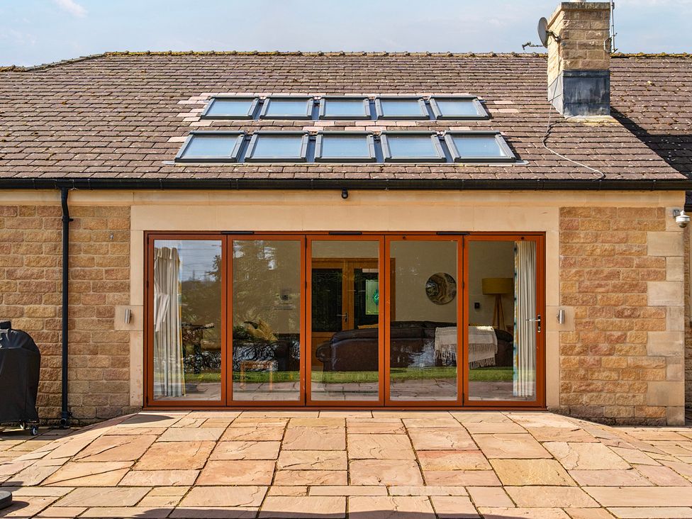 An outdoor area with glass doors and skylights at Manor House Chesterfield