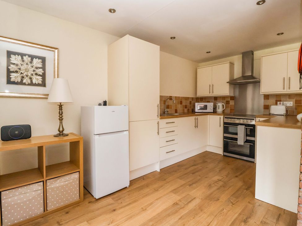 A kitchen with appliances and storage at The Milking Parlour in York