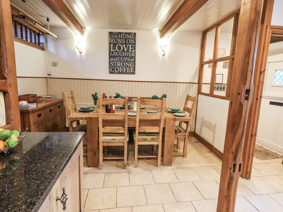 A dining room with a table and chairs at The Stables in Horton-in-Ribblesdale near Settle