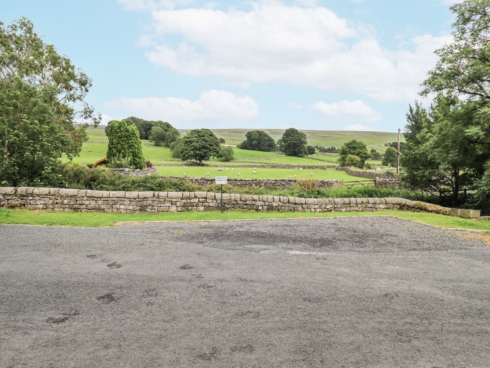 A scenic outdoor view of fields and stone walls at The Stables near Horton-in-Ribblesdale