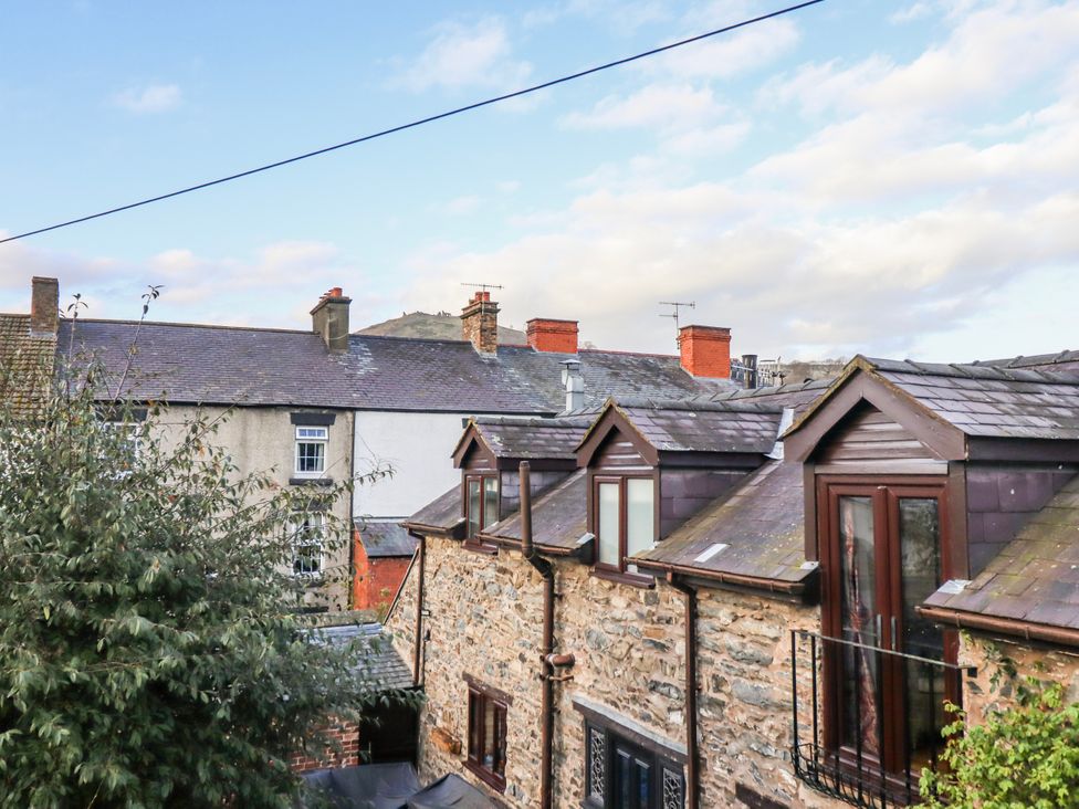 A view of rooftops and chimneys at Dovetail Cottage in Llangollen