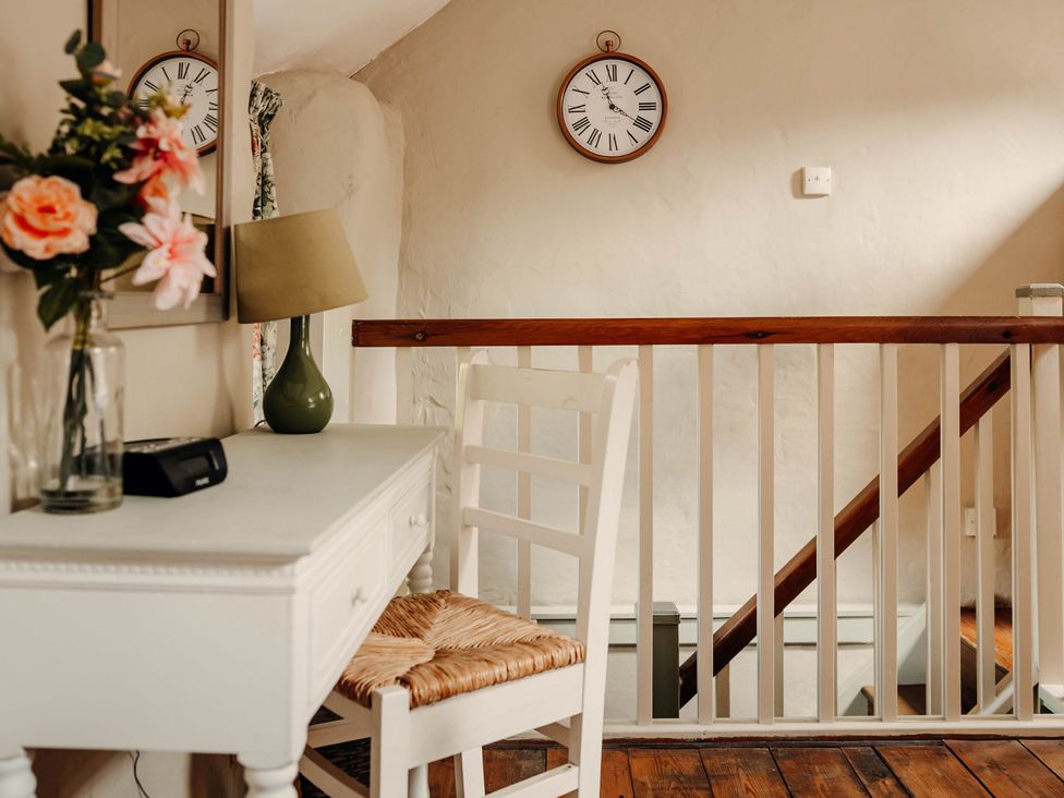 A landing with a desk and chair at The Wilderness in Stiperstones