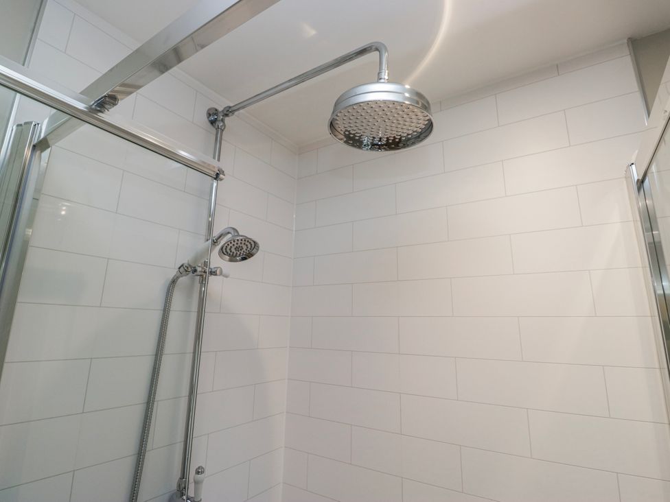 A shower with a large shower head at Jubilee in Graythwaite near Hawkshead