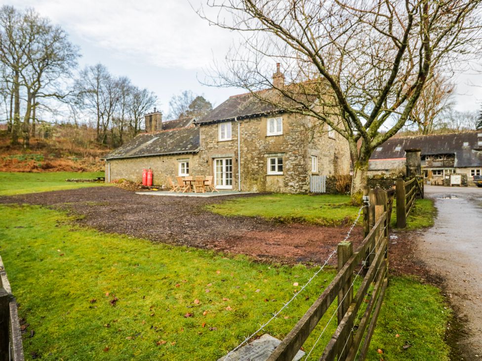 A house with tables and chairs outside at Jubilee in Graythwaite near Hawkshead