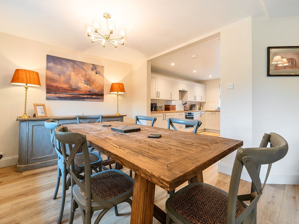 A dining room with a table and chairs at Jubilee at the Graythwaite Estate in Graythwaite near Hawkshead