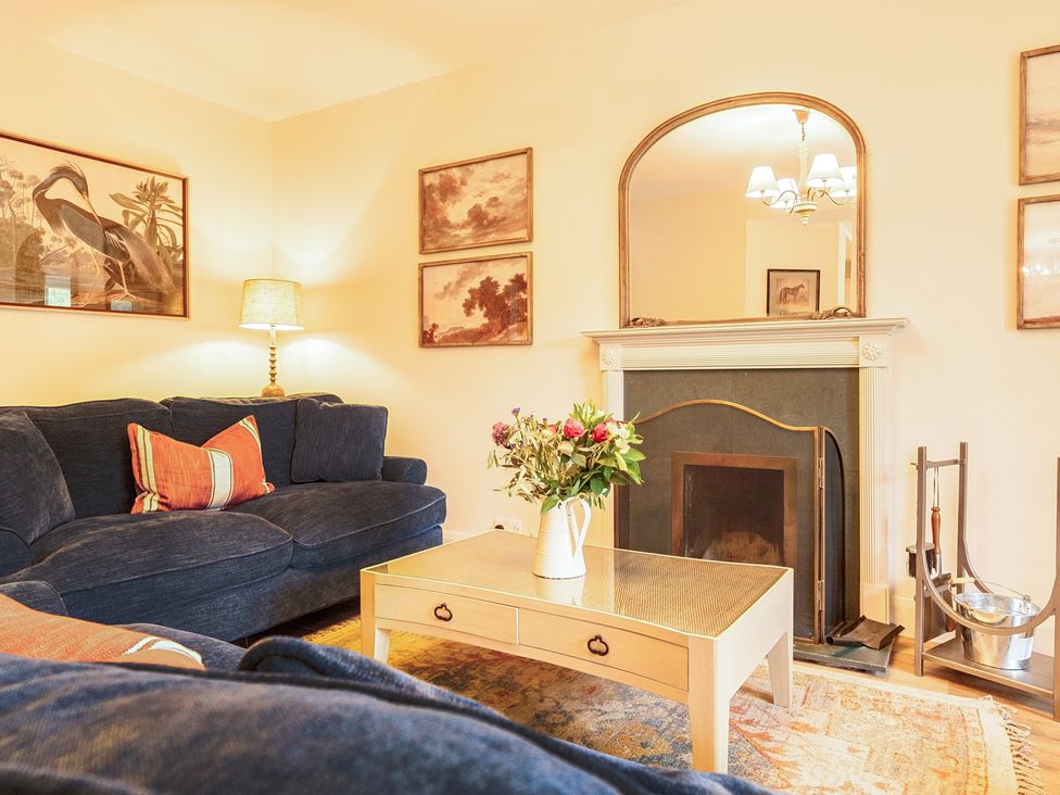A living room with a sofa and coffee table at Jubilee at the Graythwaite Estate in Graythwaite near Hawkshead