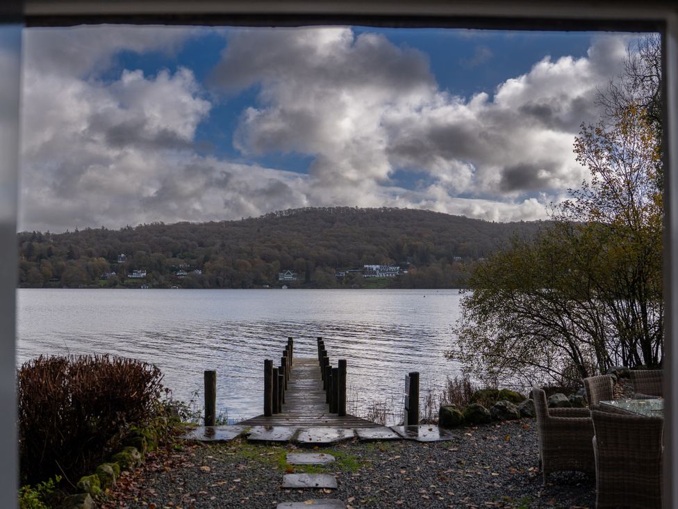 A view of a dock extending into water at Hammerhole in Graythwaite near Hawkshead
