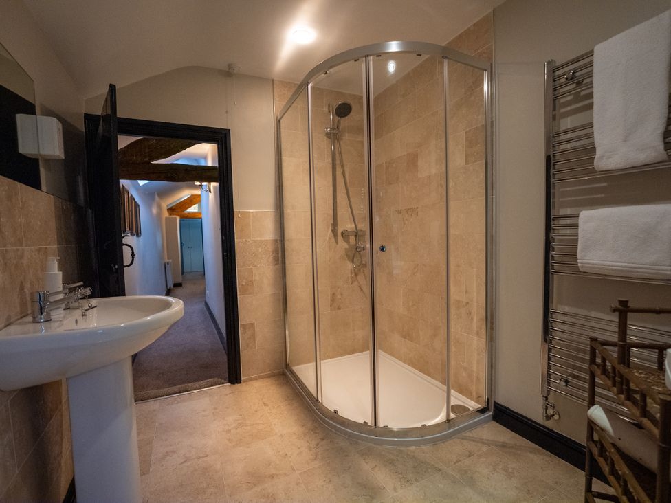A bathroom with shower and sink at Hullet Hall in Graythwaite near Hawkshead