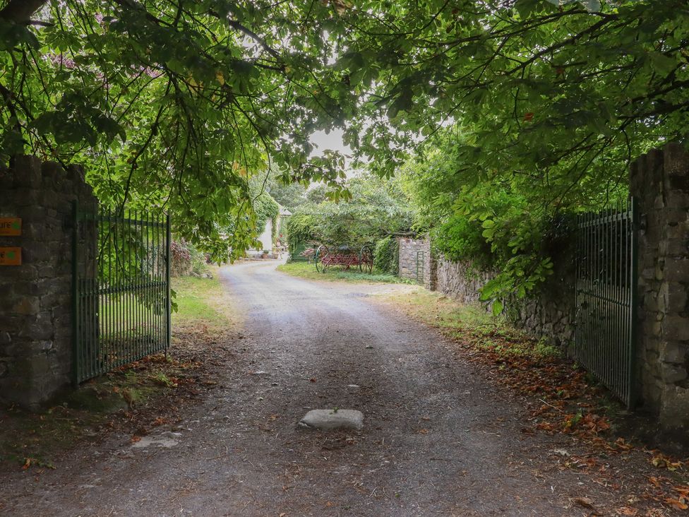 An entrance with a gate and gravel path at Mrs Delaney's Loft Ardfinnan near Clonmel County Tipperary