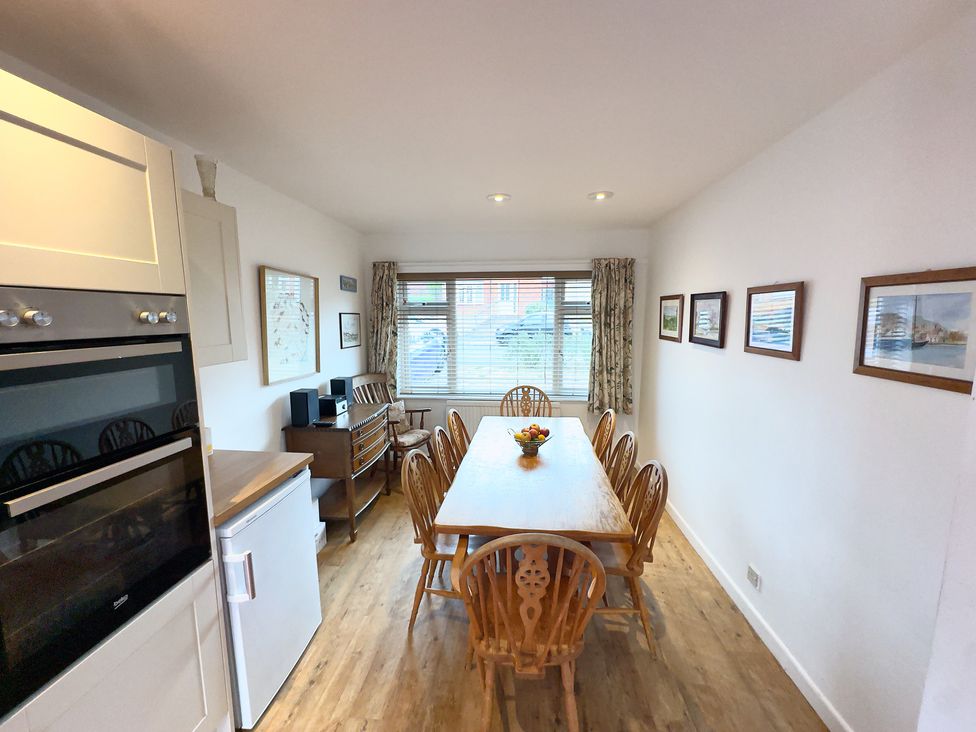 A dining area with a table and chairs at 38 Dale End in Brancaster Staithe near Burnham Market