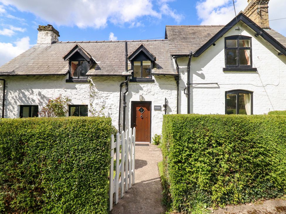 A house with a garden and pathway at Penymaes Bronygarth near Chirk