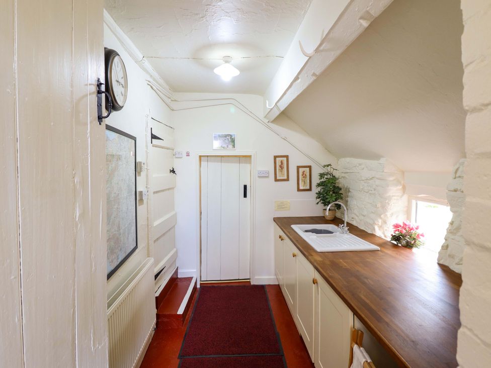 A kitchen with a sink and counter at Penymaes Bronygarth near Chirk