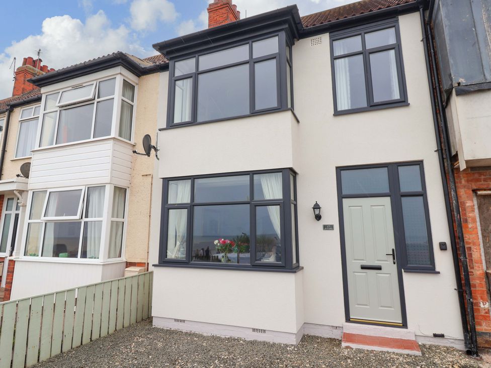A house exterior with multiple windows and a door at Sea View House in Hornsea